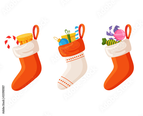 Christmas socks or stockings for Santa. Balls, gift box, sweets inside a socks on a transparent background. Xmas decorations for children. Vector flat illustration