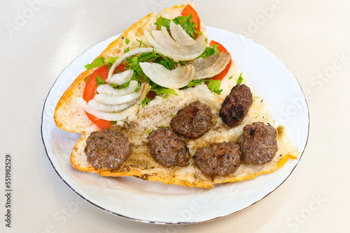 Meatball between bread (Turkish name : ekmek arasi kofte ). Izgara kofte