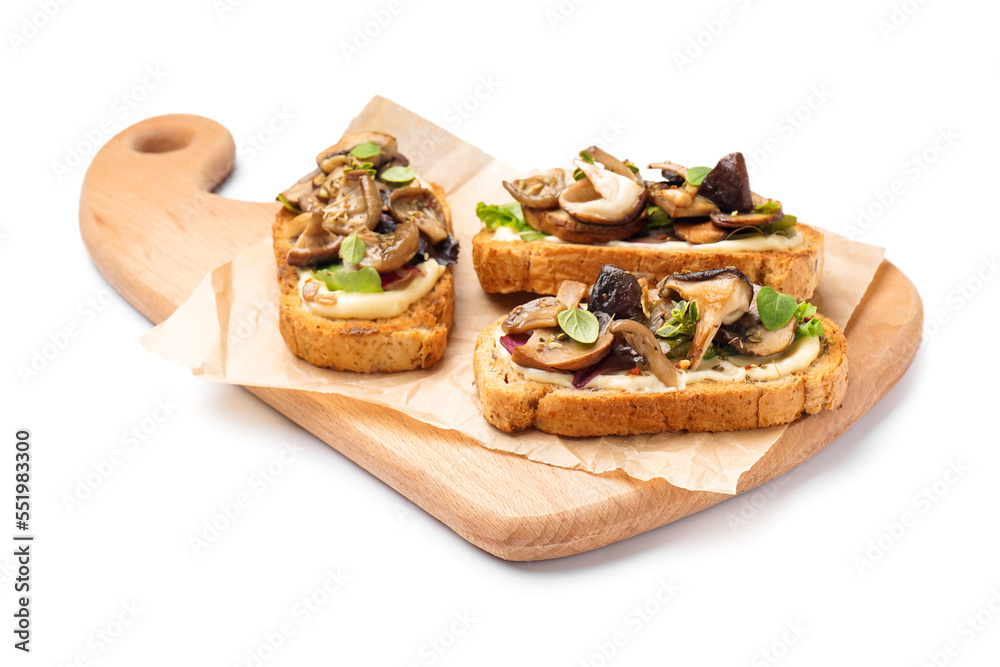 Wooden board of tasty toasts with cream cheese and mushrooms on white background