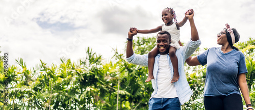 Obraz na plátně Portrait of enjoy happy love black family african american father and mother wit