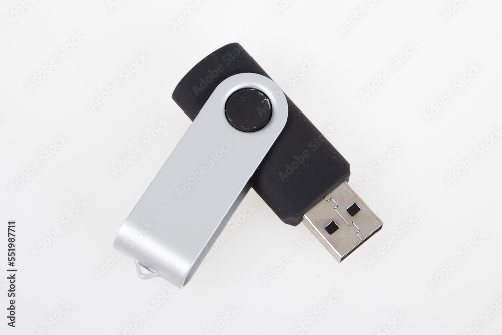 USB key flash drive drive silver black open on white background USB key flash drive drive silver black open on white background
