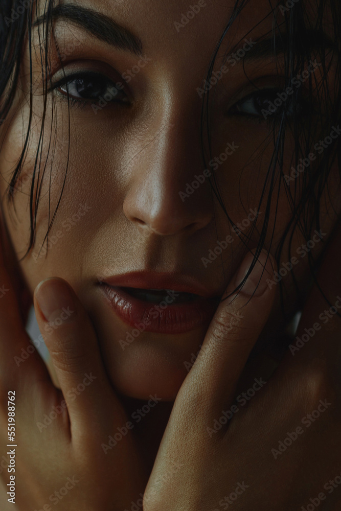 Sensual tanned beautiful woman with wet hair after shower Sensual tanned beautiful woman with wet hair after shower