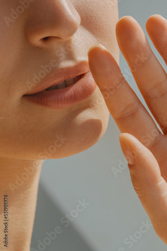 Sensual beautiful woman, lips and fingers close up