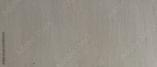 uniform background of wet sand