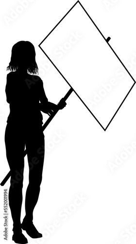 Protestor or demonstrator at a demonstration march, picket line or strike protest rally in silhouette. Holding up a banner or picket sign board placard.