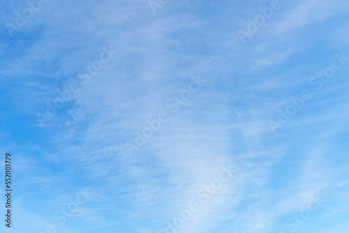 soft blue sky with light veil clouds