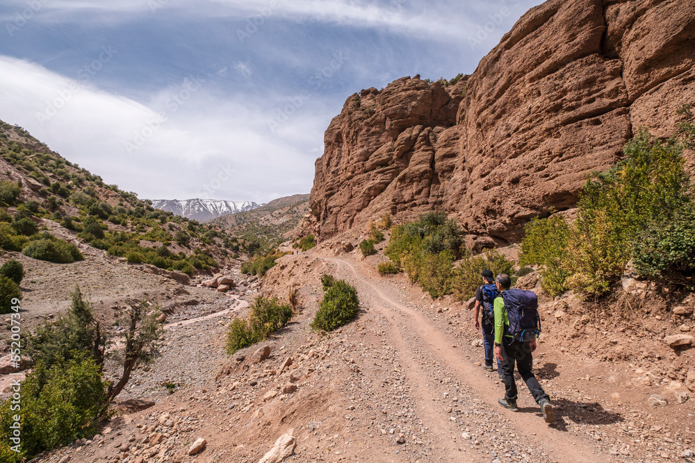walkers on the road, Arous, Bougames valley, Atlas mountain range, morocco, africa walkers on the road, Arous, Bougames valley, Atlas mountain range, morocco, africa