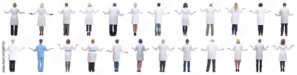 group of doctors standing with their backs isolated group of doctors standing with their backs isolated