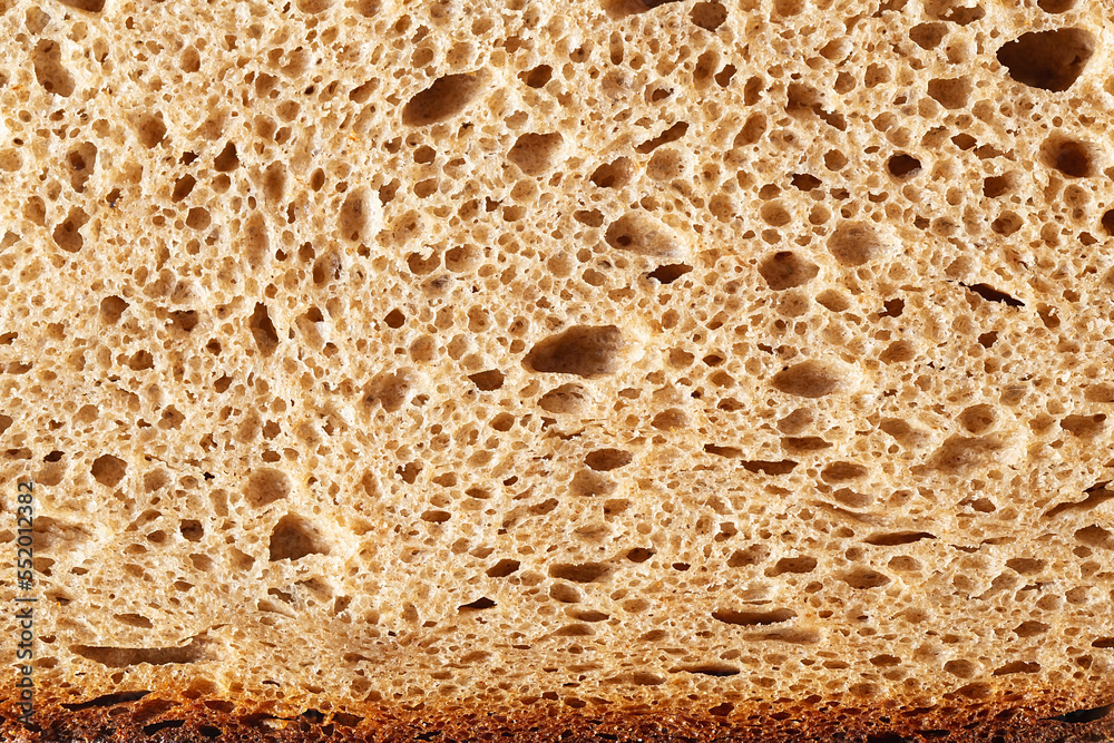 Whole wheat bread. High resolution brown bread texture background. Baking bread