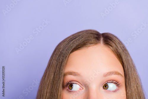 Close up cropped photo of funky pretty girl look empty blank space banner isolated on purple color background