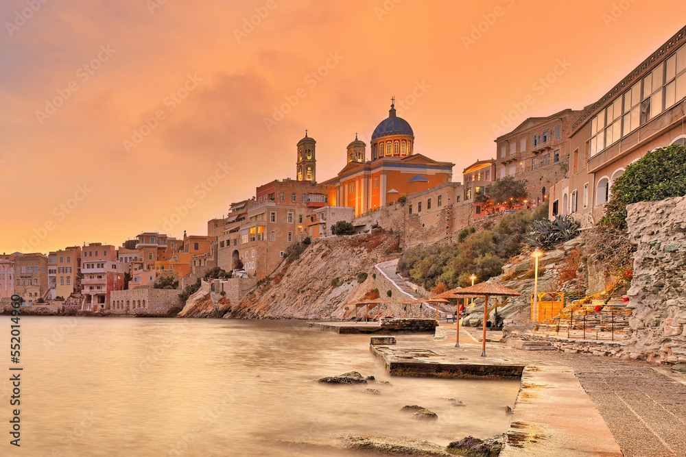 Fototapeta premium The sunset at Agios Nikolaos - Asteria - Vaporia beach in Syros, Greece