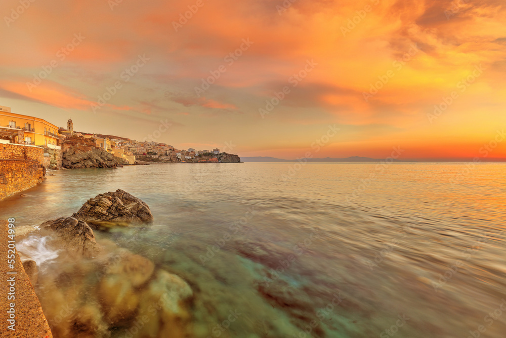 The sunrise at Agios Nikolaos - Asteria - Vaporia beach in Syros, Greece