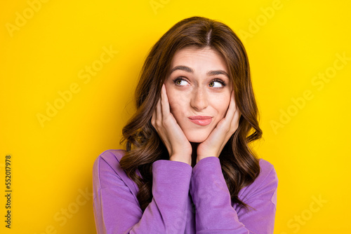 Closeup photo of lady wear purple jumper touch cheeks pouted lips unsure looking empty space want new boyfriend isolated on yellow color background