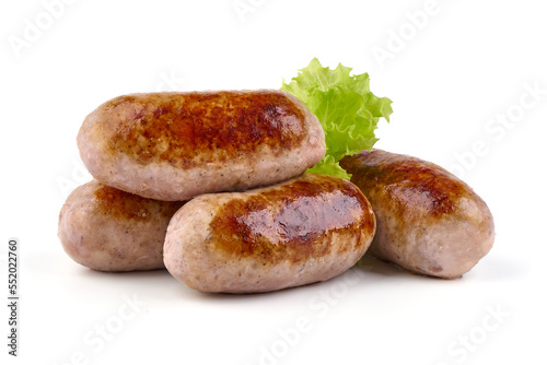 Grilled pork bangers, isolated on white background.