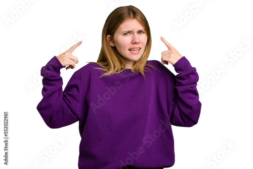Young caucasian woman isolated showing a disappointment gesture with forefinger.
