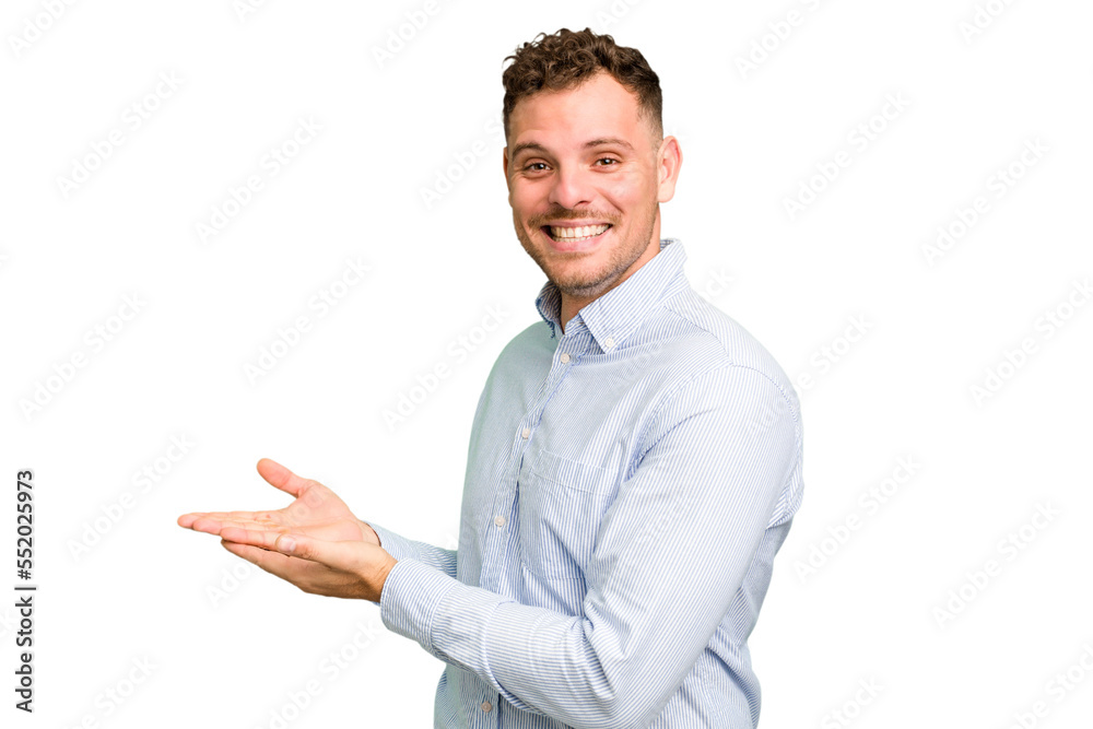 Young caucasian handsome man isolated holding a copy space on a palm.