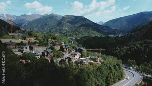 Idyllic Village Of La Massana With Green Ridges At Background In Andorra. Aerial Drone Shot photo