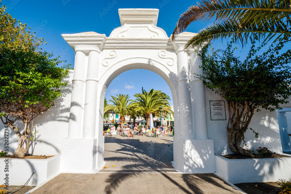 Obraz premium Entrance to picturesque settlement called Pueblo Marinero designed by Cesar Manrique located in Costa Teguise, Lanzarote, Canary Island