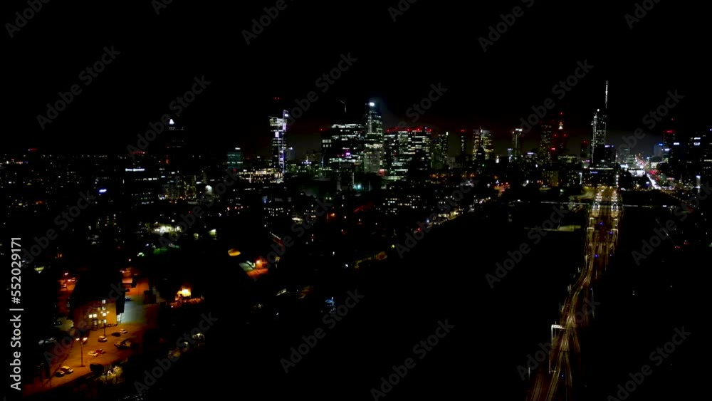 4K. Aerial shot of Warsaw city metropolis skyline at night. Spectacular aerial view of skyscraper city buildings at night. 4K. Aerial shot of Warsaw city metropolis skyline at night. Spectacular aerial view of skyscraper city buildings at night.