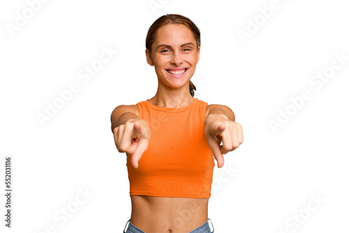 Young caucasian woman isolated cheerful smiles pointing to front.