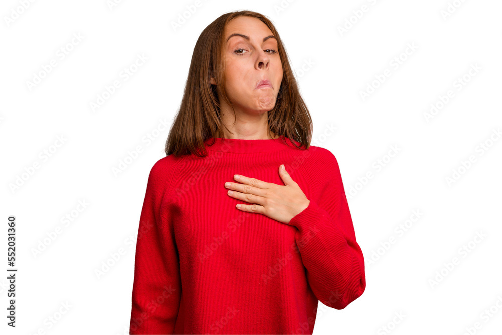 Young caucasian woman isolated taking an oath, putting hand on chest. Young caucasian woman isolated taking an oath, putting hand on chest.