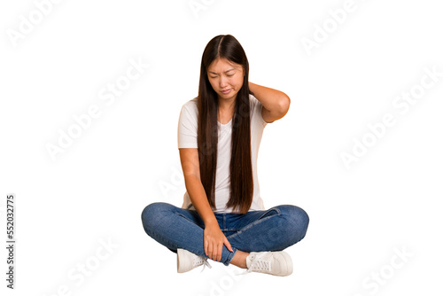 Wallpaper Mural Young asian woman sitting on the floor cutout isolated suffering neck pain due to sedentary lifestyle. Torontodigital.ca