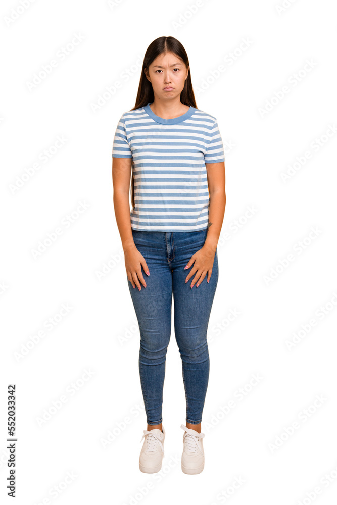 Young asian woman standing, full body cutout isolated sad, serious face, feeling miserable and displeased. Young asian woman standing, full body cutout isolated sad, serious face, feeling miserable and displeased.