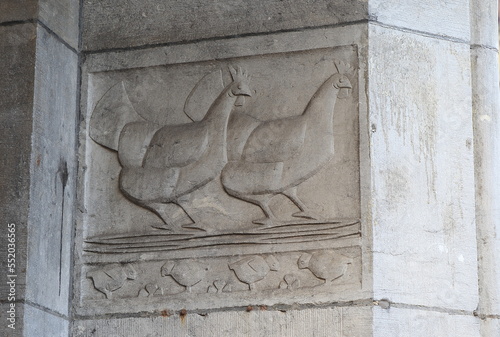 Sculpted Chickens on a Building Exterior in Amsterdam, Netherlands photo