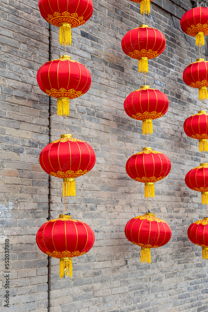 Fototapeta premium Red lanterns on the city wall