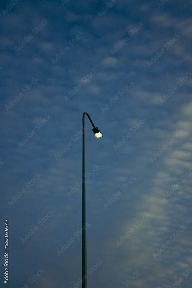 Street lights against the sky Street lights against the sky