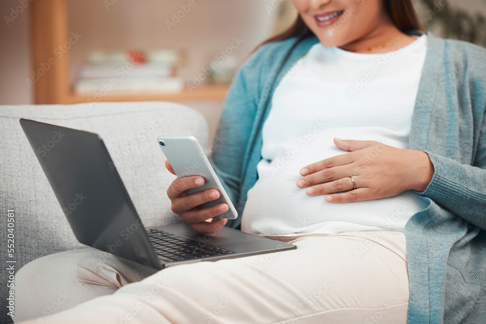 Relax, pregnancy and woman on sofa with phone and laptop in living room at home reading email or text. Internet, video call or social media, pregnant woman sitting on couch with smile surfing online. Relax, pregnancy and woman on sofa with phone and laptop in living room at home reading email or text. Internet, video call or social media, pregnant woman sitting on couch with smile surfing online.
