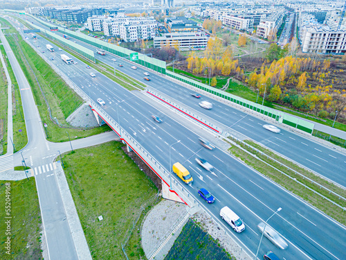 Aerial top view of bridge road automobile traffic of many cars, transportation concept