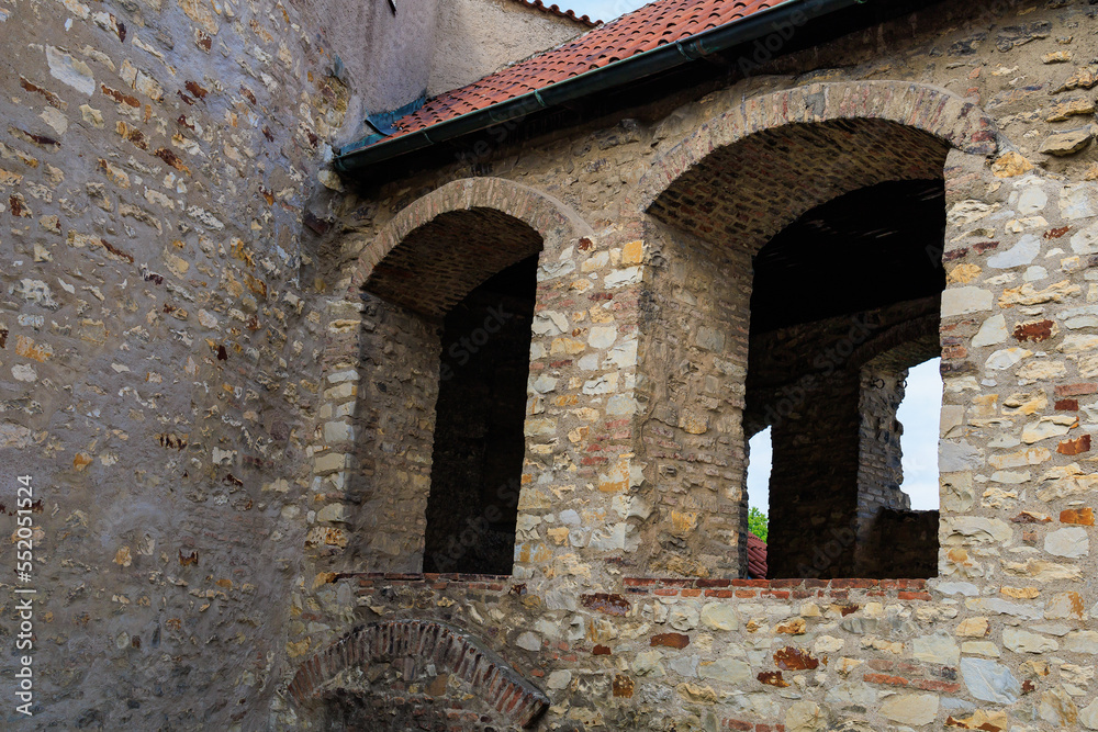 Casement windows of a medieval fortress. Background with selective focus and copy space Casement windows of a medieval fortress. Background with selective focus and copy space