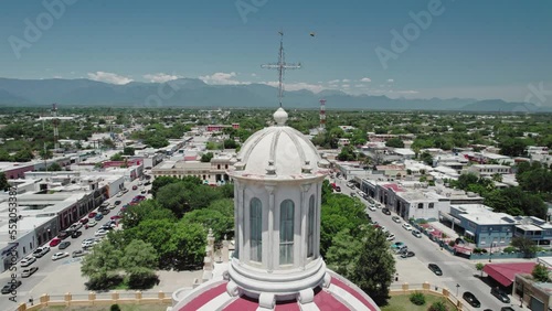 AERIAL - Government building and church, Montemorelos, Nuevo León, Mexico, circling photo