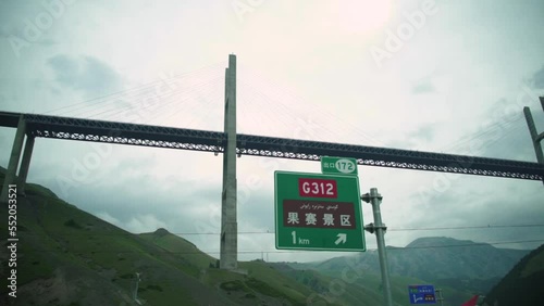 Guozigou Bridge (Talki Bridge) Against Cloudy Sky. Cable-stayed Bridge In Xinjiang, China. low angle photo