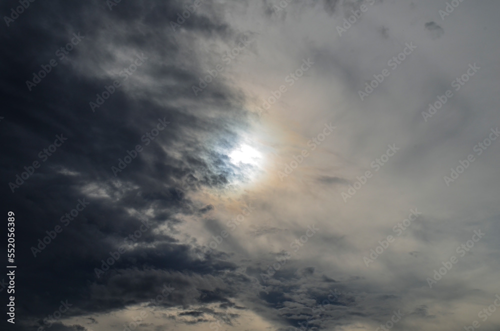 Fototapeta premium sunset on the horizon. nature in the evening. the sky's gray clouds are refracted by the evening sun. cloudy atmosphere. dramatic sky