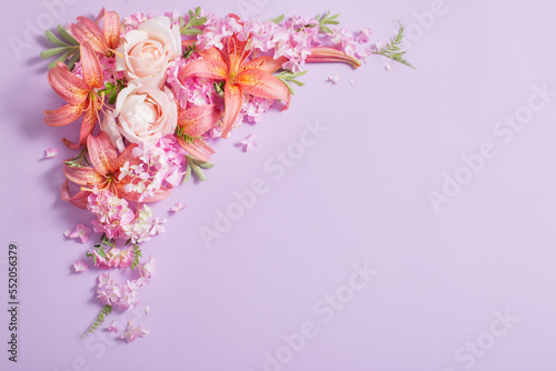 beautiful summer flowers on color paper background © Maya Kruchancova
