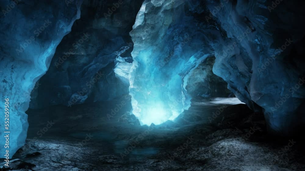 blue ice cave covered with snow and flooded with light