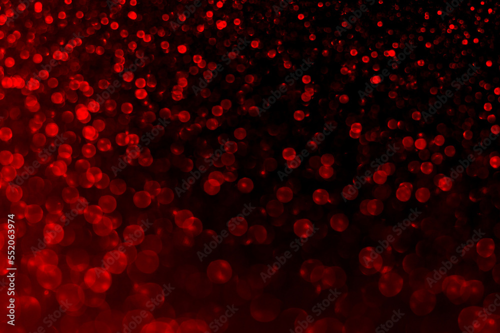 Red shiny festive beautiful background. Beautiful background of defocused shiny red round circles