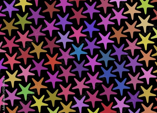 abstract   geometric background wall with small, light and rainbow color stars  mosaic tiles