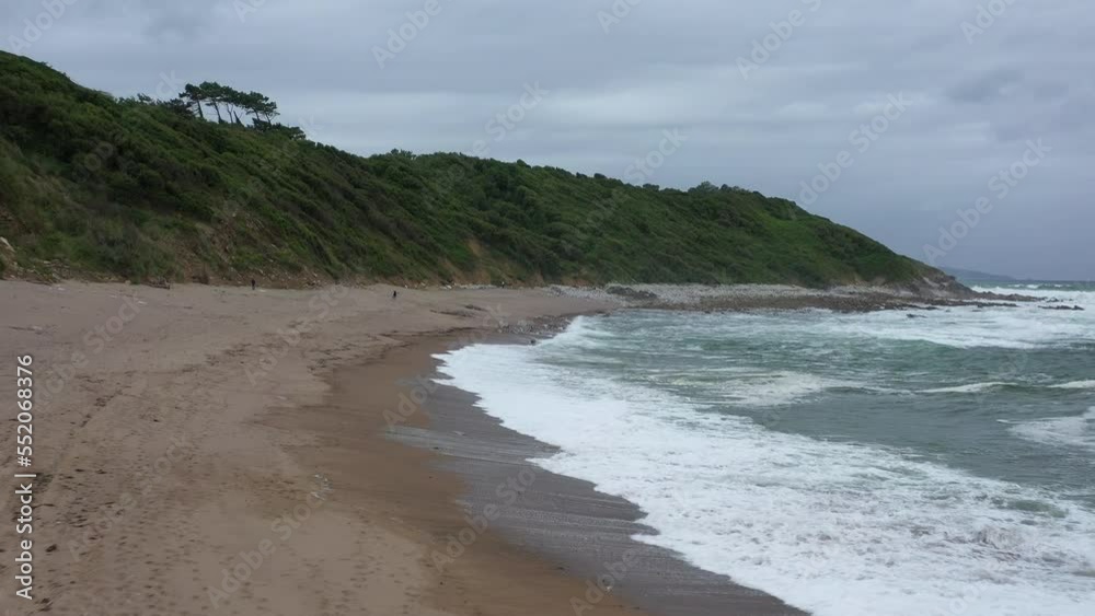 empty beach on a cloudy grey day Atlantic ocean french basque coast empty beach on a cloudy grey day Atlantic ocean french basque coast