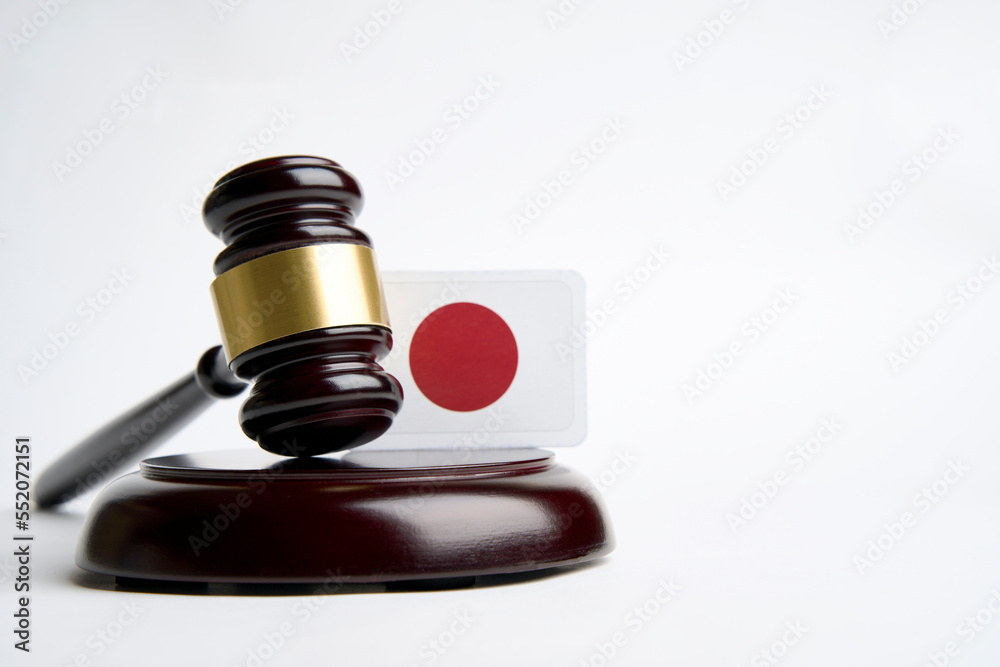 Legal law concept image, judge gavel and flag of Japan Legal law concept image, judge gavel and flag of Japan