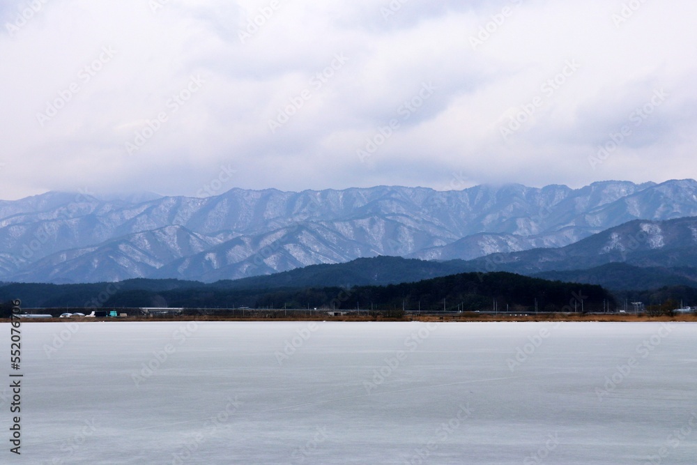 lake and mountains in winter