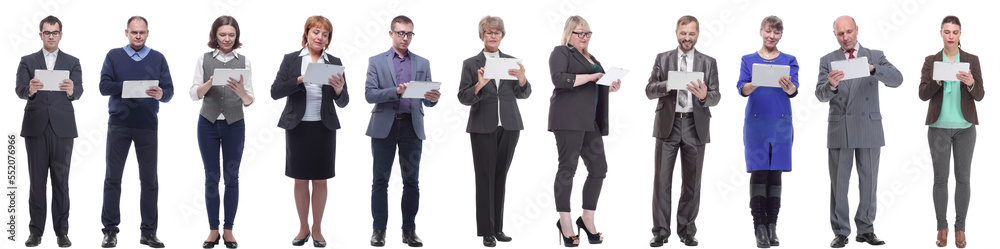 group of people holding tablet and looking into it group of people holding tablet and looking into it