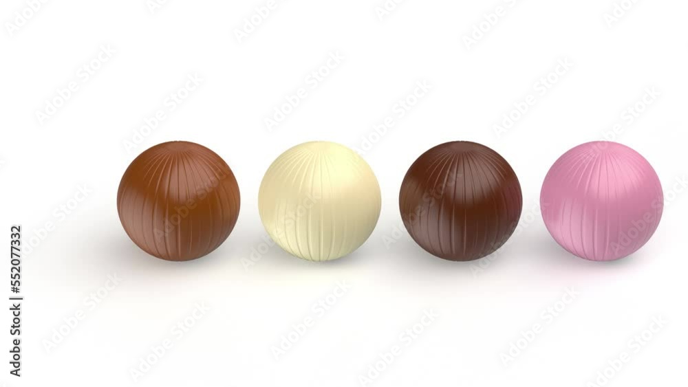 Four different chocolate balls on white background Four different chocolate balls on white background