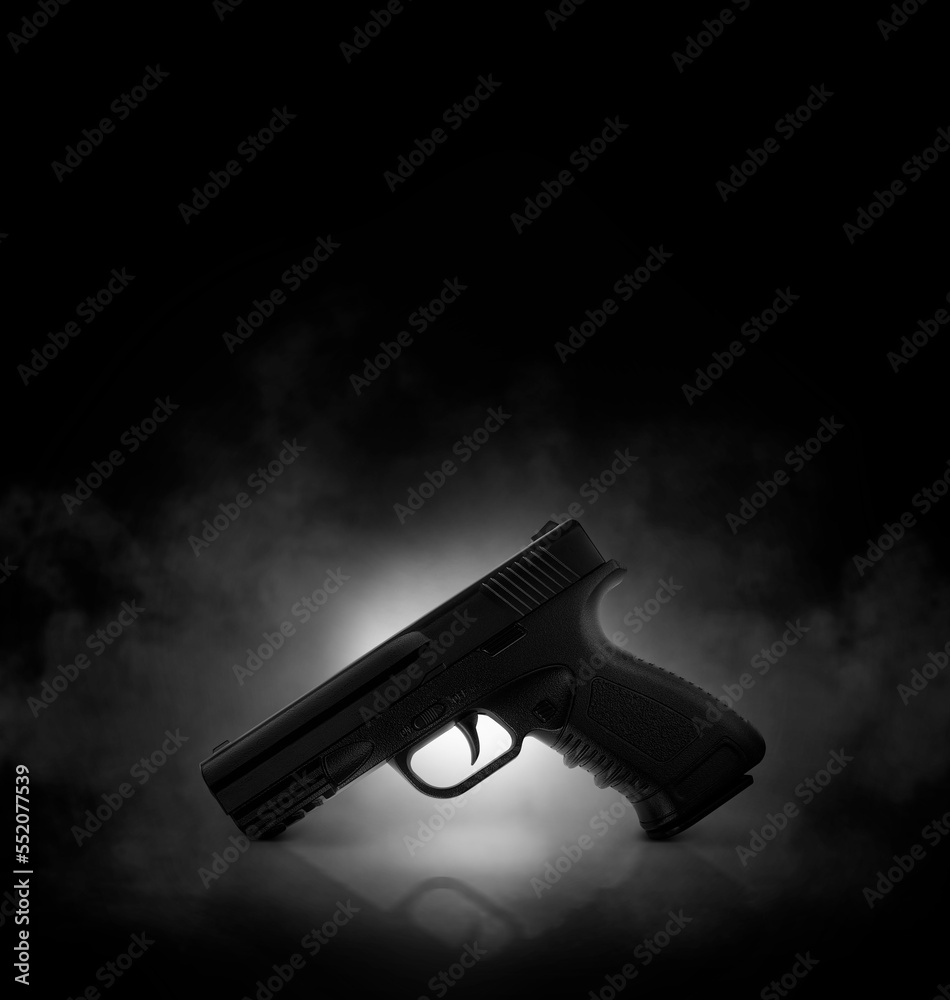 Chrome gun on black background with smoke Stock Photo | Adobe Stock