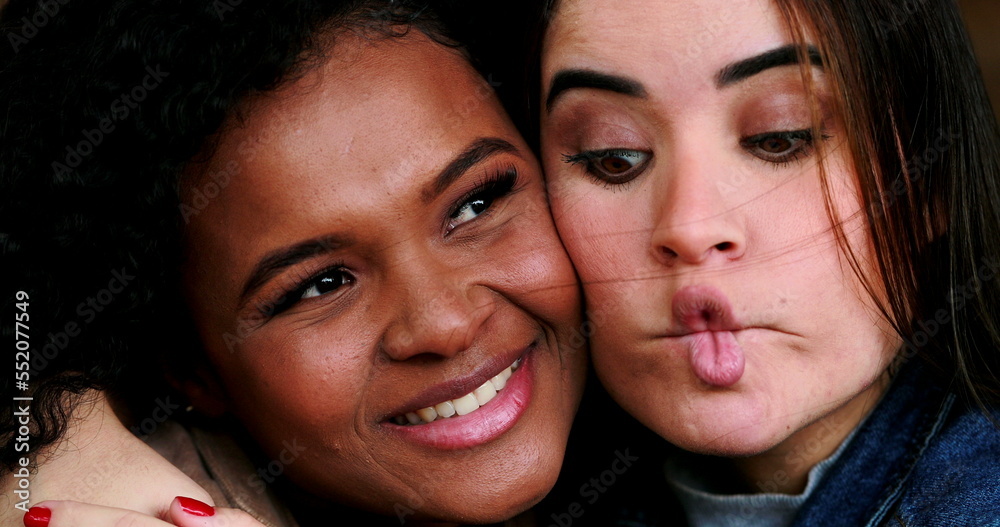 Two fund women grimacing camera, diversity concept. Bonding friendship Two fund women grimacing camera, diversity concept. Bonding friendship