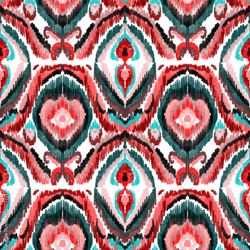 Colorful ikat pattern in vintage style. Elegant ethnic background. Hand drawn oriental art. Seamless geometric vintage texture.	