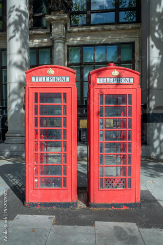 Two red classic british phone boxes in London  UK
