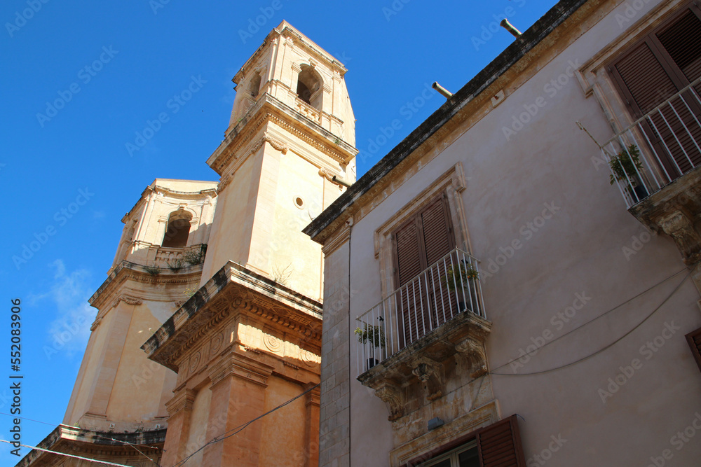 palace (?) and baroque church (montevergine) in noto in sicily (italy)